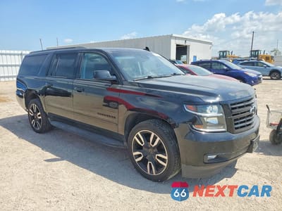 Czwarte zdjęcie samochodu z boku: 2020 CHEVROLET SUBURBAN K1500 PREMIER VIN:1GNSKJKJ5LR143970 - miniatura