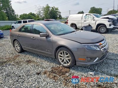 Czwarte zdjęcie samochodu z boku: 2010 FORD FUSION HYBRID VIN:3FADP0L37AR426990 - miniatura