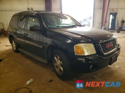 Czwarte zdjęcie samochodu z boku: 2004 GMC ENVOY XUV VIN:1GKET12S046180945 - miniatura