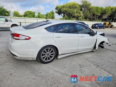 Trzecie zdjęcie samochodu z tyłu: 2017 FORD FUSION SE VIN:3FA6P0HDXHR397375 - miniatura