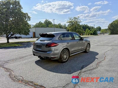 Czwarte zdjęcie samochodu z boku: 2013 PORSCHE CAYENNE GTS VIN:WP1AD2A20DLA78351 - miniatura