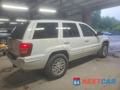 Trzecie zdjęcie samochodu z tyłu: 2004 JEEP GRAND CHEROKEE LIMITED VIN:1J4GW58SX4C313619 - miniatura