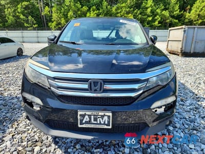 Piąte zdjęcie samochodu w środku: 2017 HONDA PILOT EXLN VIN:5FNYF6H72HB055729 - miniatura
