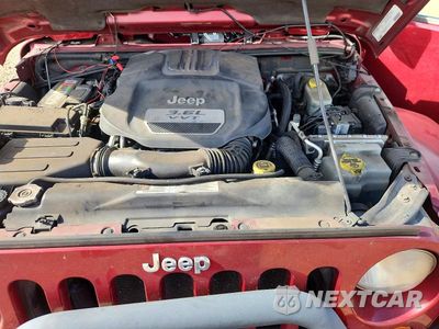Zdjęcie 12 z 14 samochodu: 2012 JEEP WRANGLER SAHARA VIN:1C4AJWBGXCL146228 - miniatura