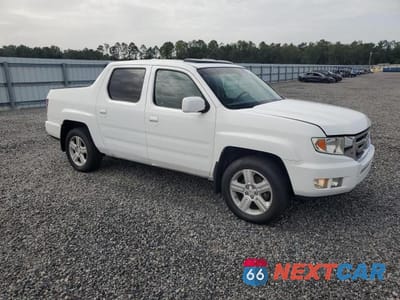Czwarte zdjęcie samochodu z boku: 2011 HONDA RIDGELINE RTL VIN:5FPYK1F57BB454103 - miniatura