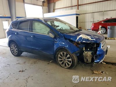 Czwarte zdjęcie samochodu z boku: 2017 FORD ESCAPE TITANIUM VIN:1FMCU0J99HUE43889 - miniatura
