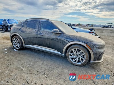 Czwarte zdjęcie samochodu z boku: 2024 GENESIS GV60 ADVANCED VIN:KMUKCDSC1RU020291 - miniatura