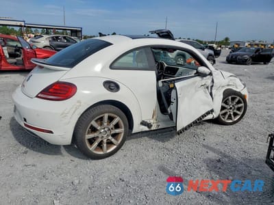 Trzecie zdjęcie samochodu z tyłu: 2017 VOLKSWAGEN BEETLE SE VIN:3VWJ17AT8HM606865 - miniatura