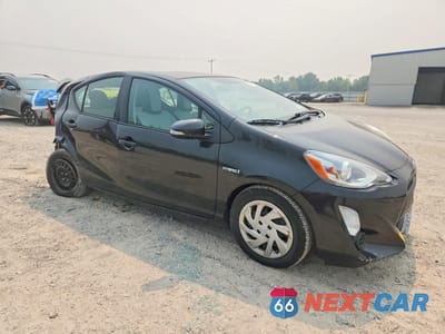 Czwarte zdjęcie samochodu z boku: 2015 TOYOTA PRIUS C ONE VIN:JTDKDTB32F1107043 - miniatura