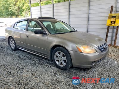 Czwarte zdjęcie samochodu z boku: 2003 NISSAN ALTIMA 2.5 VIN:1N4AL11DX3C110548 - miniatura