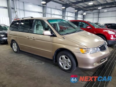 Czwarte zdjęcie samochodu z boku: 2000 HONDA ODYSSEY EX VIN:2HKRL1878YH556934 - miniatura
