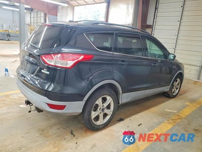Trzecie zdjęcie samochodu z tyłu: 2013 FORD ESCAPE SE VIN:1FMCU0G92DUD72133 - miniatura