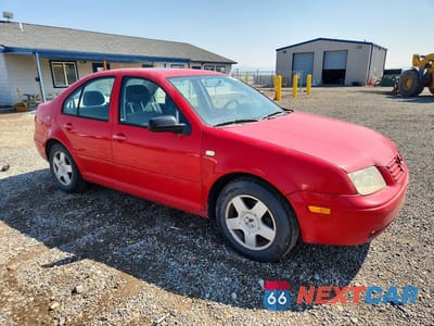 Czwarte zdjęcie samochodu z boku: 1999 VOLKSWAGEN JETTA GLS VIN:3VWSC29M0XM067719 - miniatura