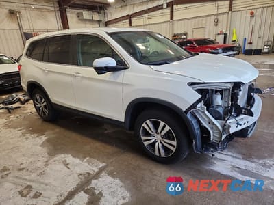 Czwarte zdjęcie samochodu z boku: 2017 HONDA PILOT EXLN VIN:5FNYF6H77HB026419 - miniatura