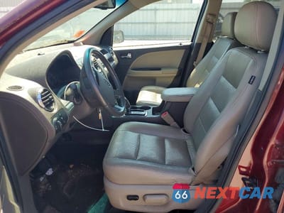 Zdjęcie 7 z 12 samochodu: 2008 FORD TAURUS X SEL VIN:1FMDK05W38GA44209 - miniatura