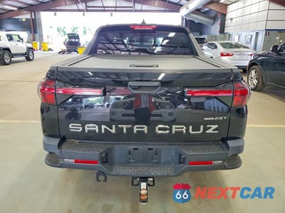 Zdjęcie 6 z 12 samochodu: 2022 HYUNDAI SANTA CRUZ SEL PREMIUM VIN:5NTJDDAF0NH013507 - miniatura