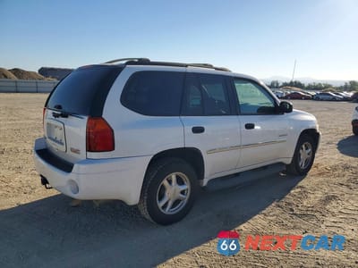 Trzecie zdjęcie samochodu z tyłu: 2006 GMC ENVOY VIN:1GKDT13S362124745 - miniatura