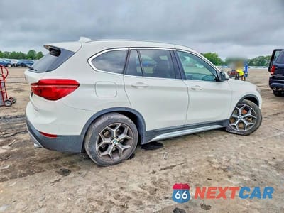 Trzecie zdjęcie samochodu z tyłu: 2019 BMW X1 XDRIVE28I VIN:WBXHT3C54K5L97904 - miniatura