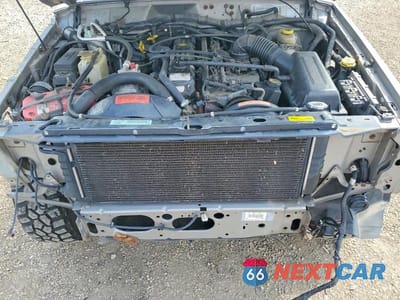 Zdjęcie 12 z 14 samochodu: 2001 JEEP CHEROKEE SPORT VIN:1J4FF48S91L539801 - miniatura