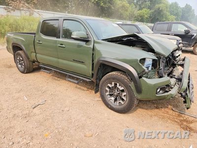 Czwarte zdjęcie samochodu z boku: 2021 TOYOTA TACOMA TRD OFF-ROAD VIN:3TMDZ5BNXMM117827 - miniatura