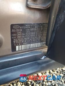 Zdjęcie 12 z 12 samochodu: 2004 HYUNDAI SANTA FE GLS VIN:KM8SC13D44U842807 - miniatura