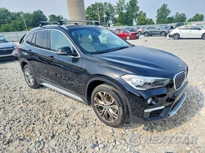 Czwarte zdjęcie samochodu z boku: 2017 BMW X1 XDRIVE28I VIN:WBXHT3C36H5F80022 - miniatura