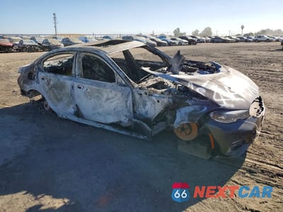 Czwarte zdjęcie samochodu z boku: 2022 BMW 330I VIN:3MW5R1J03N8C36202 - miniatura
