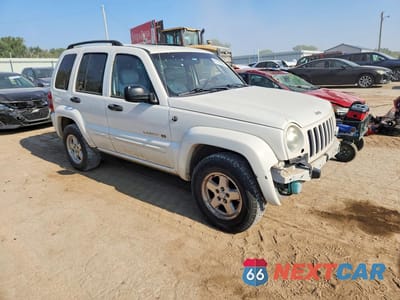 Czwarte zdjęcie samochodu z boku: 2003 JEEP LIBERTY LIMITED VIN:1J4GL58K93W534506 - miniatura