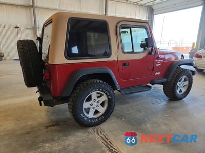 Trzecie zdjęcie samochodu z tyłu: 1999 JEEP WRANGLER / TJ SPORT VIN:1J4FY19S1XP431293 - miniatura