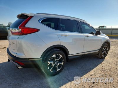 Trzecie zdjęcie samochodu z tyłu: 2017 HONDA CR-V TOURING VIN:2HKRW2H95HH654799 - miniatura