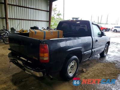 Trzecie zdjęcie samochodu z tyłu: 1999 GMC NEW SIERRA C1500 VIN:1GTEC14W1XZ510705 - miniatura