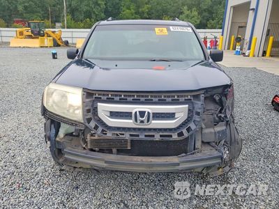 Piąte zdjęcie samochodu w środku: 2011 HONDA PILOT LX VIN:5FNYF3H22BB036995 - miniatura
