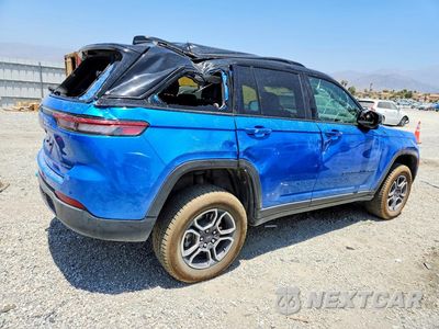 Trzecie zdjęcie samochodu z tyłu: 2022 JEEP GRAND CHEROKEE TRAILHAWK 4XE VIN:1C4RJYC66N8748019 - miniatura