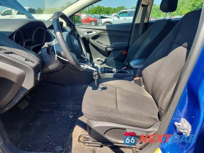Zdjęcie 7 z 12 samochodu: 2018 FORD FOCUS SE VIN:1FADP3F28JL233847 - miniatura
