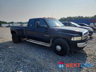 Czwarte zdjęcie samochodu z boku: 2001 DODGE RAM 3500 VIN:1B7MC33621J260342 - miniatura