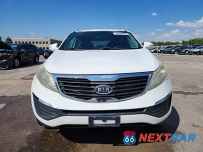 Piąte zdjęcie samochodu w środku: 2012 KIA SPORTAGE LX VIN:KNDPBCA21C7234346 - miniatura