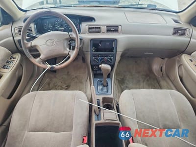 Zdjęcie 8 z 12 samochodu: 1999 TOYOTA CAMRY LE VIN:JT2BG28K0X0340421 - miniatura