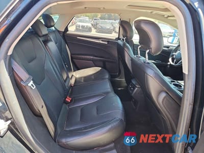Zdjęcie 10 z 12 samochodu: 2014 FORD FUSION TITANIUM PHEV VIN:3FA6P0SU7ER136094 - miniatura