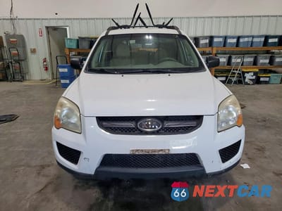 Piąte zdjęcie samochodu w środku: 2009 KIA SPORTAGE LX/EX VIN:KNDJE723797560141 - miniatura