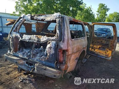 Trzecie zdjęcie samochodu z tyłu: 2000 FORD EXCURSION LIMITED VIN:1FMSU43F1YED27599 - miniatura