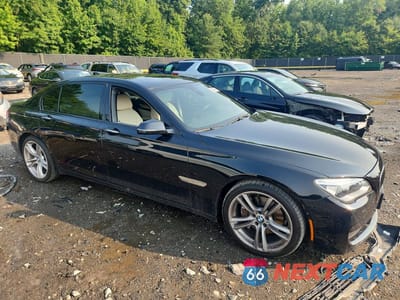 Czwarte zdjęcie samochodu z boku: 2015 BMW 740 LXI VIN:WBAYF4C56FD874013 - miniatura