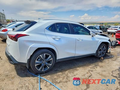Trzecie zdjęcie samochodu z tyłu: 2023 LEXUS UX 250H PREMIUM VIN:JTHP6JBH4P2159509 - miniatura