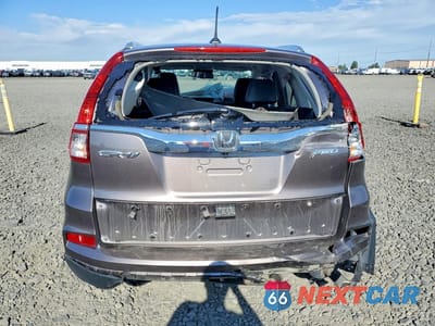 Zdjęcie 6 z 14 samochodu: 2016 HONDA CR-V TOURING VIN:5J6RM4H90GL133995 - miniatura