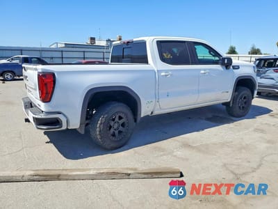 Trzecie zdjęcie samochodu z tyłu: 2021 GMC SIERRA K1500 AT4 VIN:3GTU9EETXMG324484 - miniatura