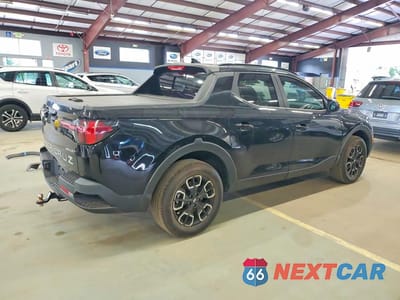 Trzecie zdjęcie samochodu z tyłu: 2022 HYUNDAI SANTA CRUZ SEL PREMIUM VIN:5NTJDDAF0NH013507 - miniatura