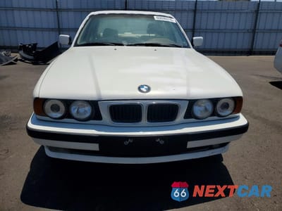 Piąte zdjęcie samochodu w środku: 1995 BMW 525 I VIN:WBAHD5323SGB37770 - miniatura