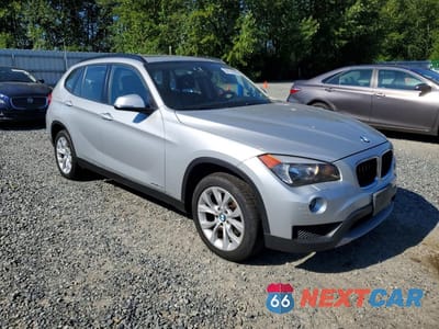 Czwarte zdjęcie samochodu z boku: 2014 BMW X1 XDRIVE28I VIN:WBAVL1C54EVY23810 - miniatura