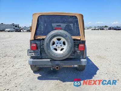 Zdjęcie 6 z 12 samochodu: 1999 JEEP WRANGLER SE VIN:1J4FY19S9XP460945 - miniatura