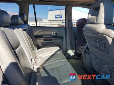 Zdjęcie 11 z 12 samochodu: 2005 HONDA PILOT EXL VIN:2HKYF18685H560309 - miniatura