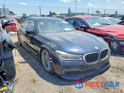 Czwarte zdjęcie samochodu z boku: 2016 BMW 750I XDRIVE MSPORT VIN:WBA7F2C55GG420836 - miniatura